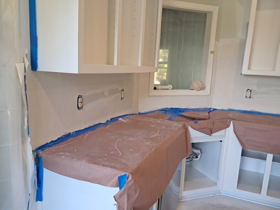 Kitchen in progress before cabinets, counters, and tile